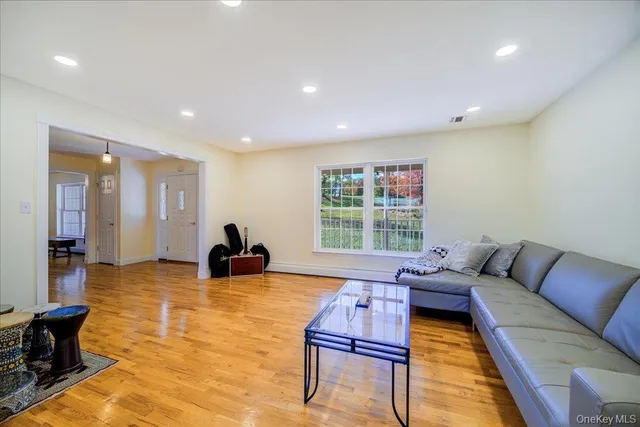 a living room with furniture and a couch