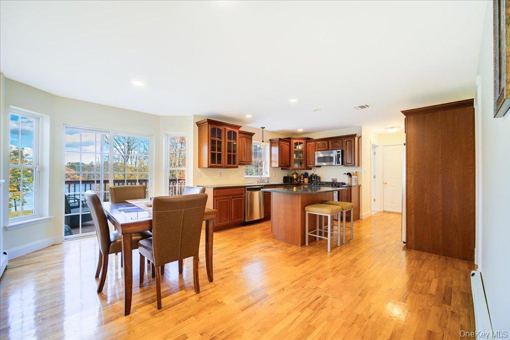 34 Twin Lakes Road Monroe, NY 10950 - Photo 10 of 35 a dining room with furniture and wooden floor