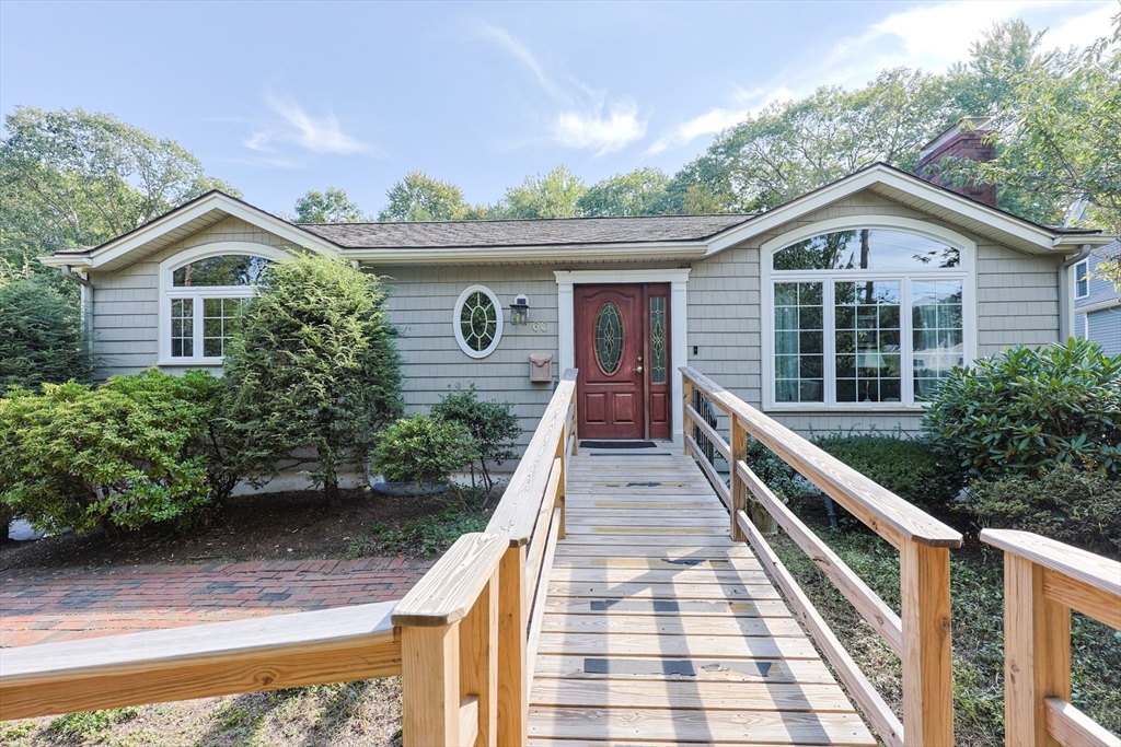 60 Deerfield Road Needham, MA 02492 - Photo 1 of 31 a view of a house with a yard