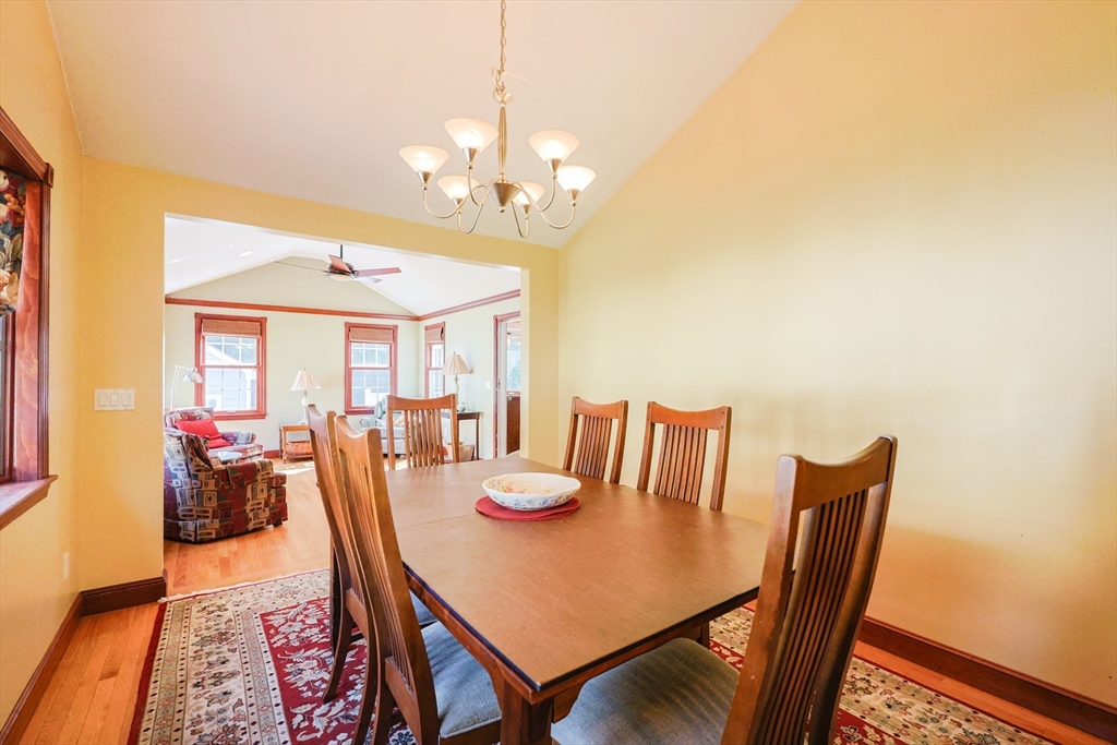 60 Deerfield Road Needham, MA 02492 - Photo 14 of 31 a view of a dining room with furniture window and outside view