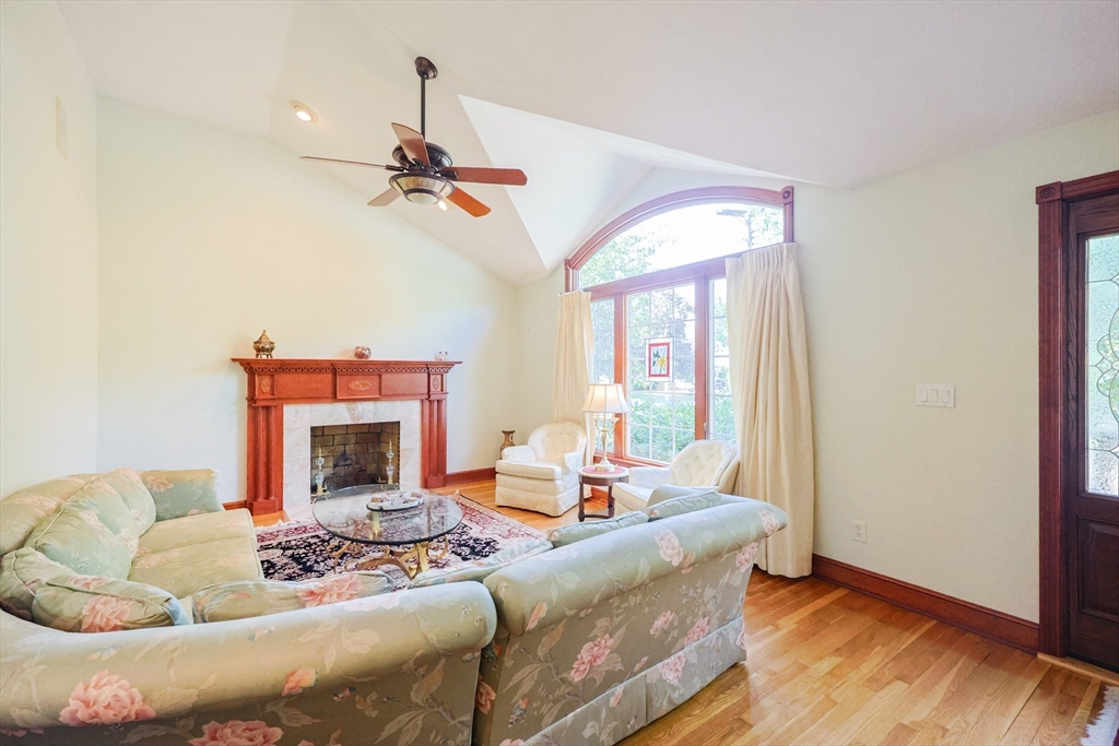 60 Deerfield Road Needham, MA 02492 - Photo 20 of 31 a living room with furniture fireplace and a window