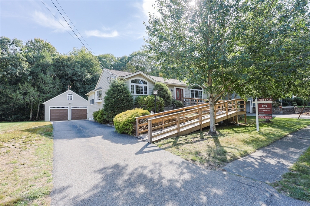 60 Deerfield Road Needham, MA 02492 - Photo 2 of 31 a view of a house with a yard and sitting area