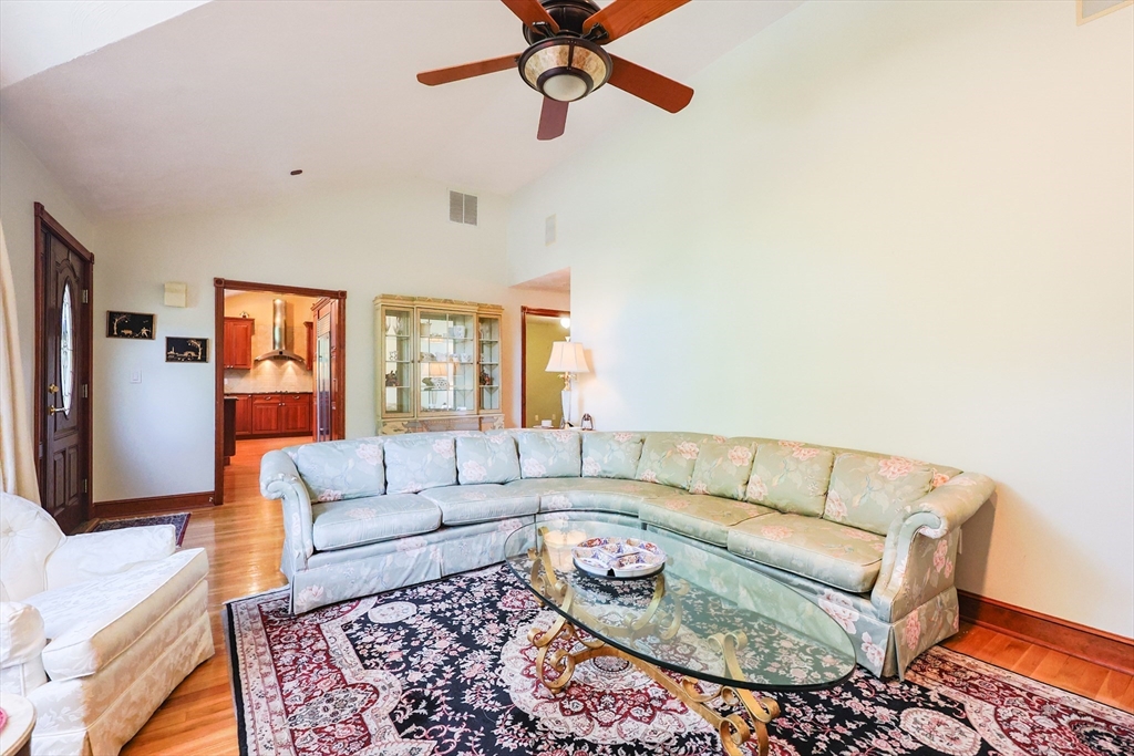60 Deerfield Road Needham, MA 02492 - Photo 21 of 31 a living room with furniture and a couch