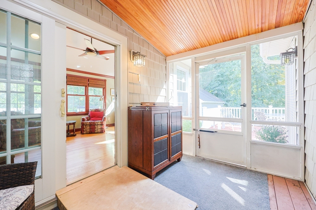 60 Deerfield Road Needham, MA 02492 - Photo 27 of 31 a view of a hallway with furniture and front door