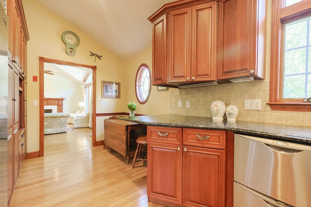 60 Deerfield Road Needham, MA 02492 - Photo 7 of 31 a large bathroom with double vanity sink a mirror and a shower