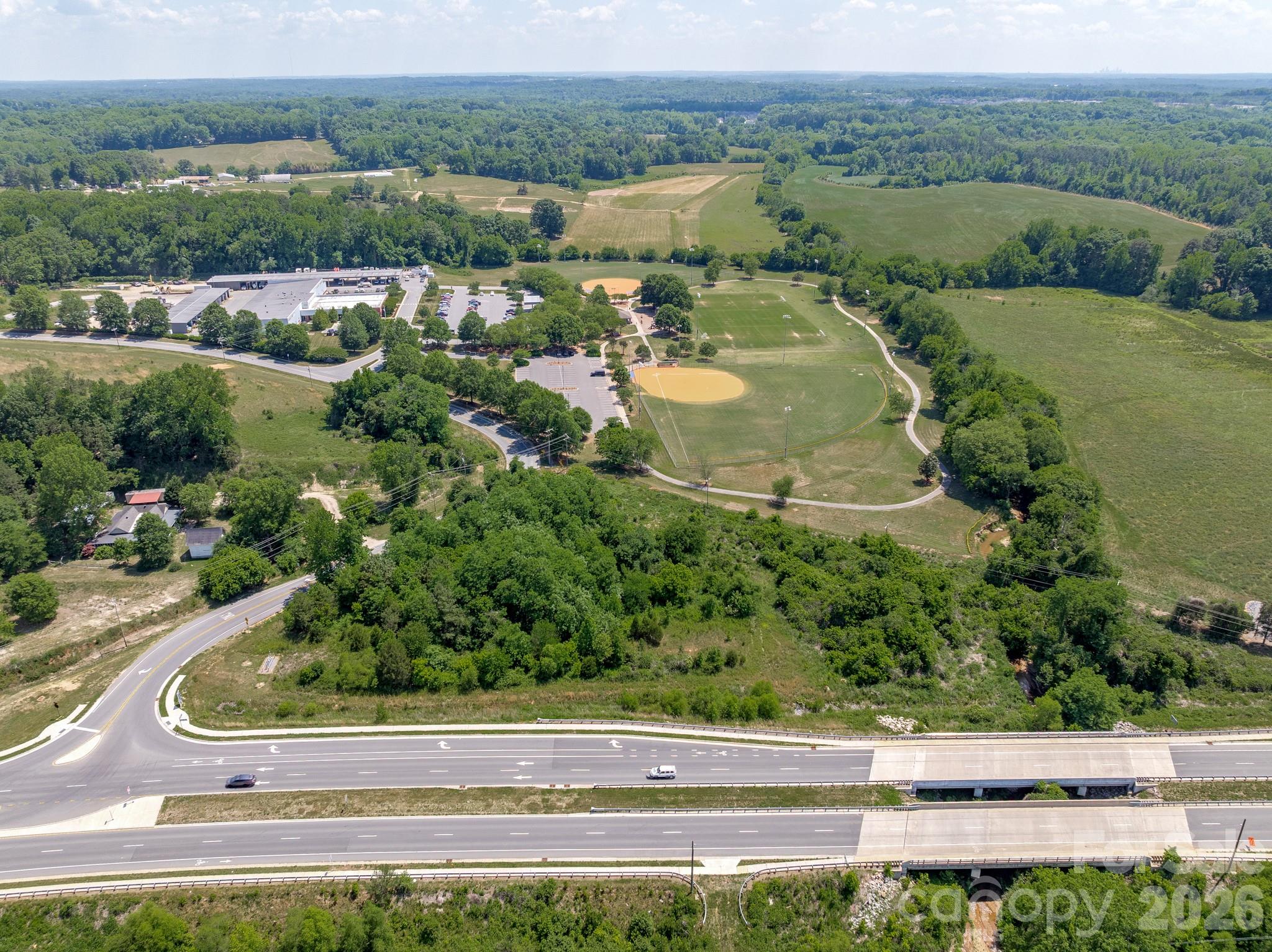 1599 Bethpage Road Kannapolis, NC 28081 - Photo 6 of 13 an aerial view of a house with a yard