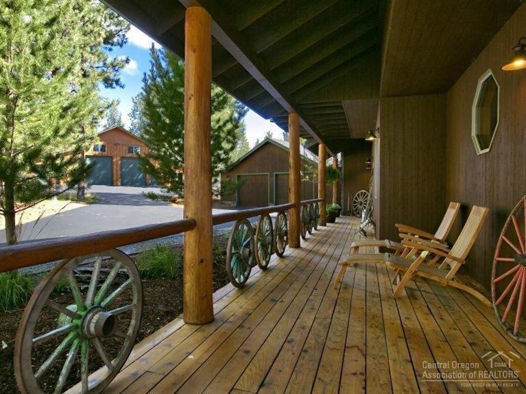 16172 Foothill Loop Sisters, OR 97759 - Photo 2 of 22 Wrap around deck from front of home with