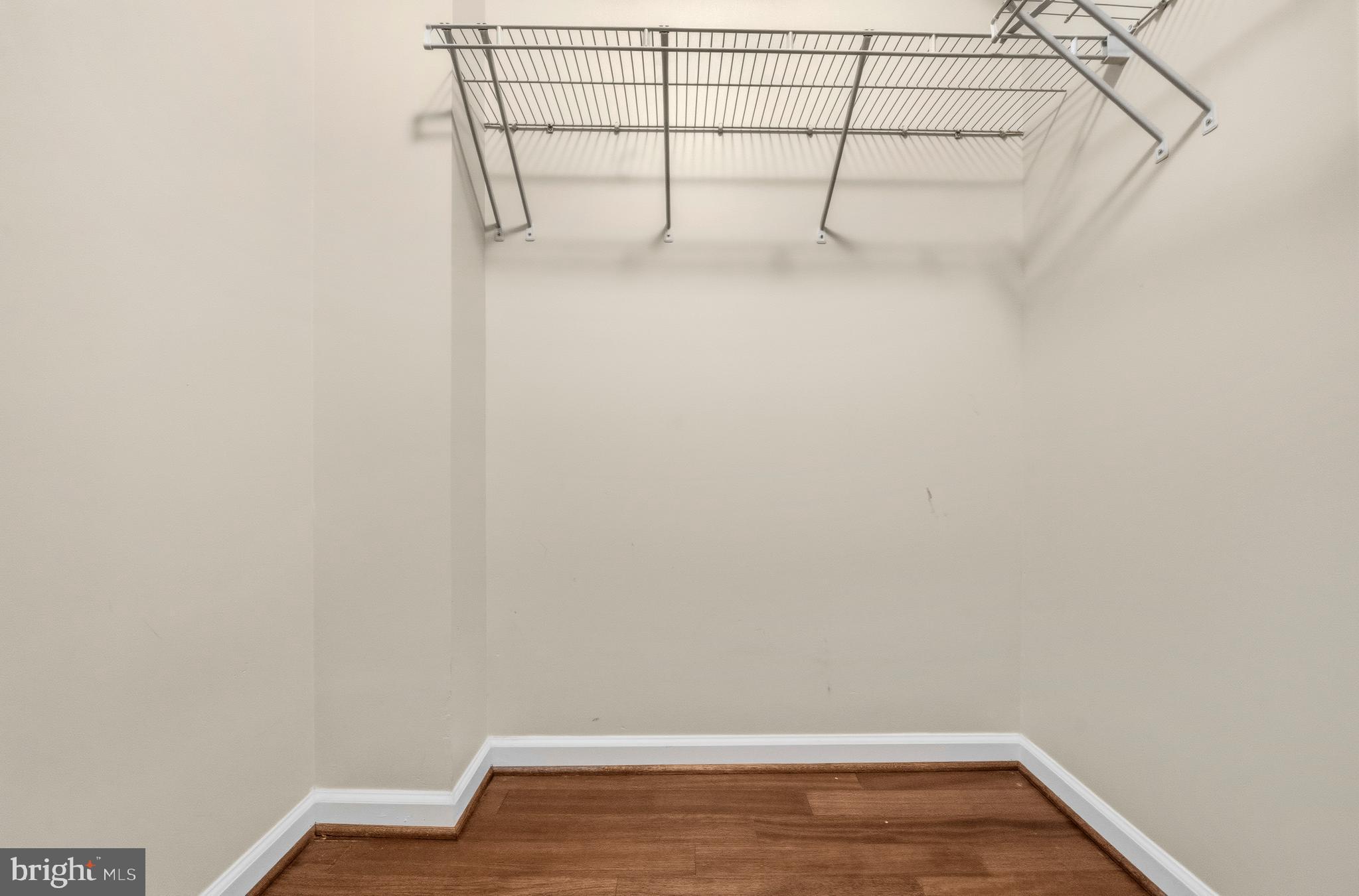 7923 Eastern Avenue Northwest, Unit 105 Silver Spring, MD 20910 - Photo 13 of 32 a view of a room with racks on the wall