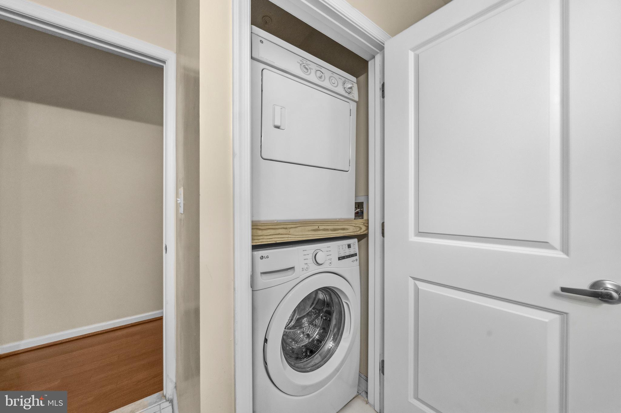 7923 Eastern Avenue Northwest, Unit 105 Silver Spring, MD 20910 - Photo 15 of 32 a utility room with dryer and washer