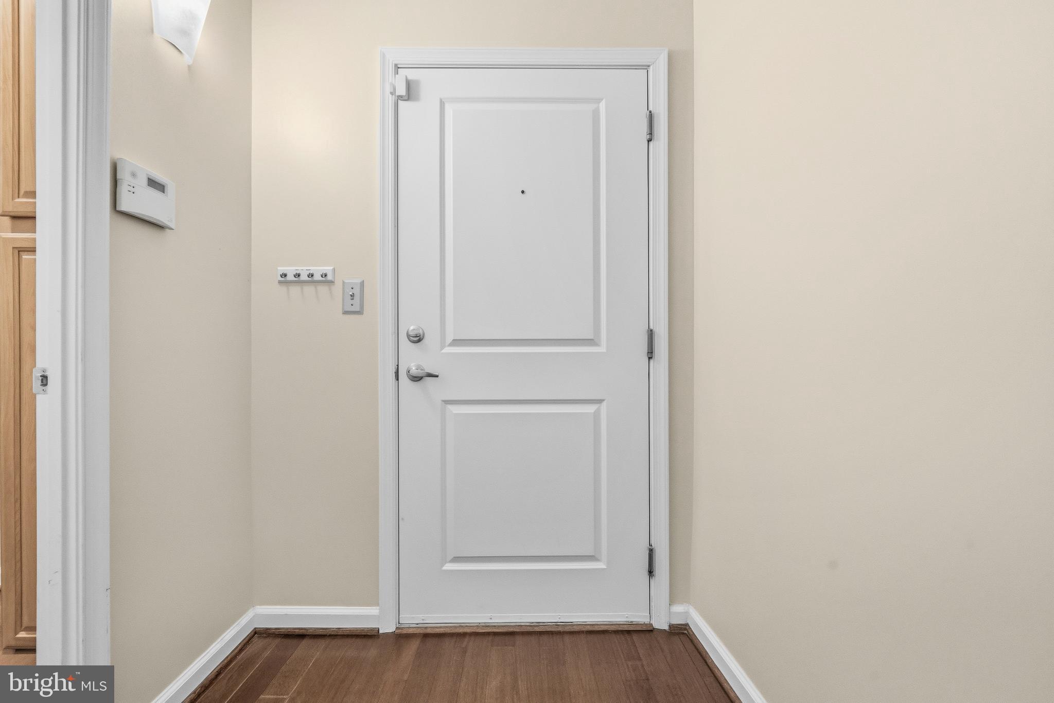 7923 Eastern Avenue Northwest, Unit 105 Silver Spring, MD 20910 - Photo 2 of 32 a view of an empty room
