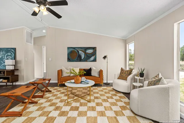 a view of a livingroom with furniture and a living room