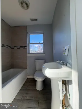 a view of hallway with mirror