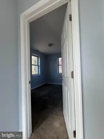 a view of a room that has a window in it