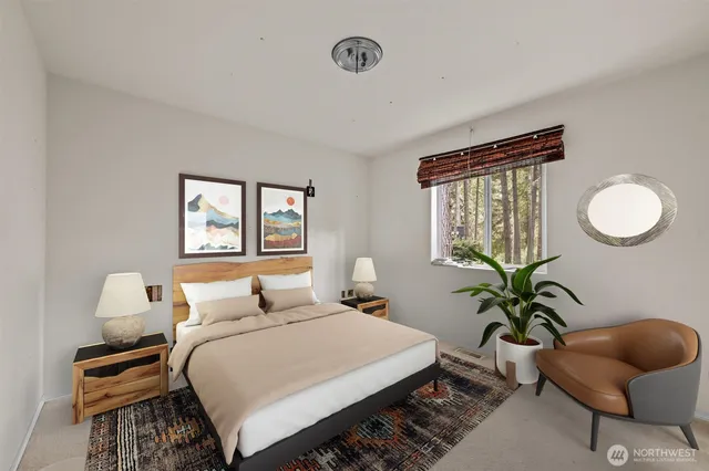 a bedroom with a bed and a window