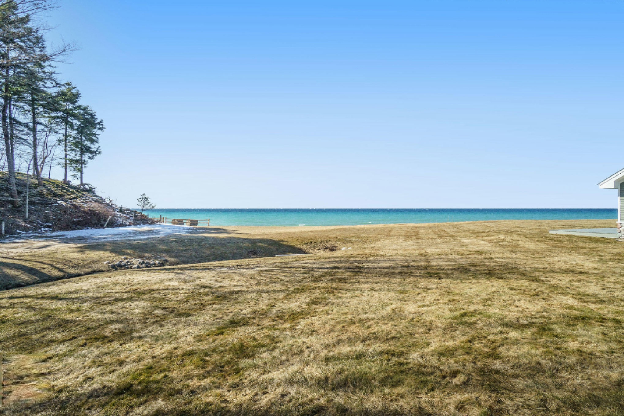6706 Lakeshore Road Manistee, MI 49660 - Photo 23 of 30 Creek runs to LK MI