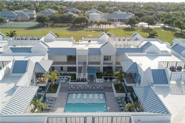a view of a swimming pool with a patio