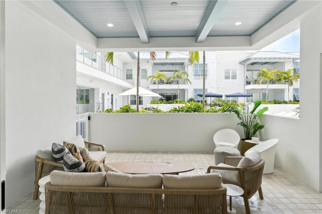 201 8th Street South, Unit 208 Naples, FL 34102 - Photo 23 of 39 View of patio / terrace