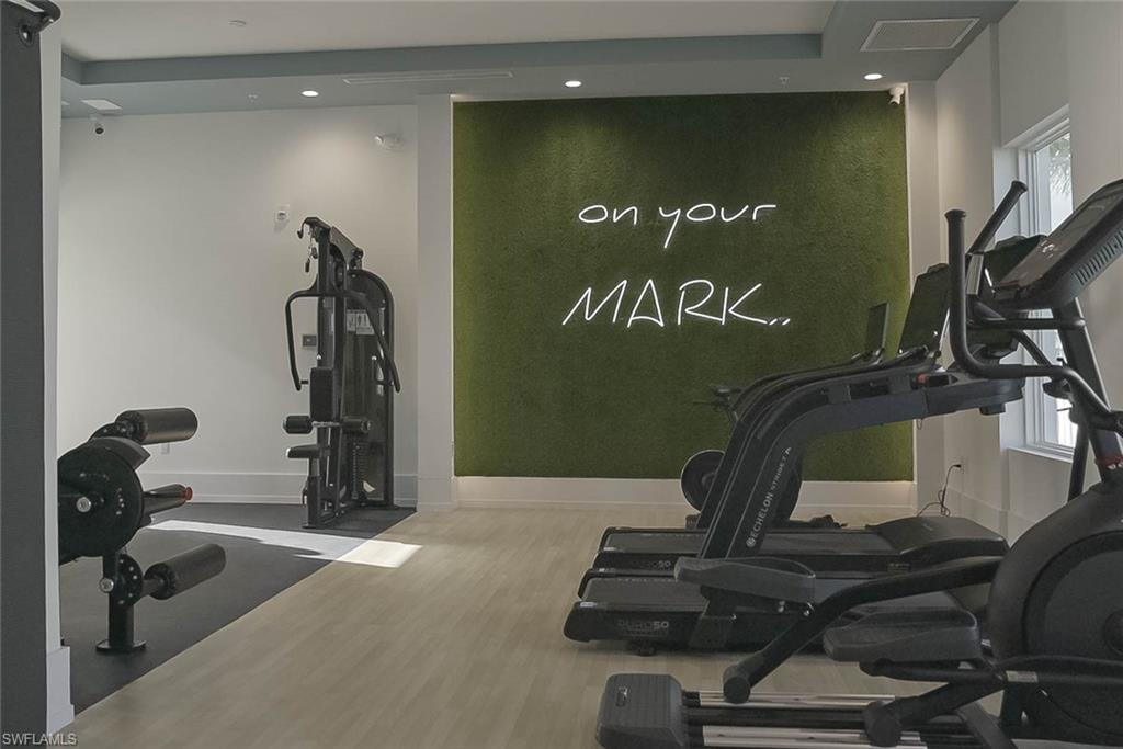 201 8th Street South, Unit 208 Naples, FL 34102 - Photo 30 of 39 Gym with state of the art equipment - this is on the amenity deck which is just steps from the patio