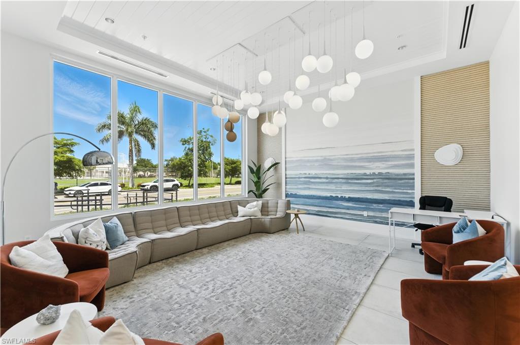 201 8th Street South, Unit 208 Naples, FL 34102 - Photo 34 of 39 Gorgeous lobby on the ground level with mail area and elevator