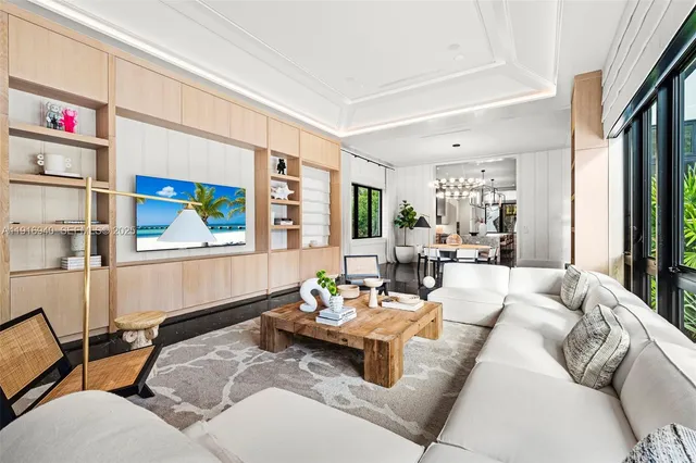 a spacious bedroom with a bed and a large window