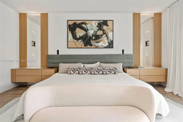 a view of a bathroom with a tub and large windows