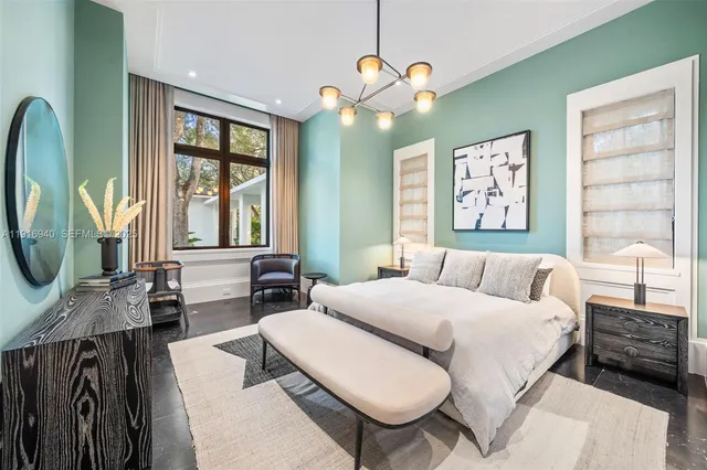 a bathroom with a granite countertop shower sink and toilet
