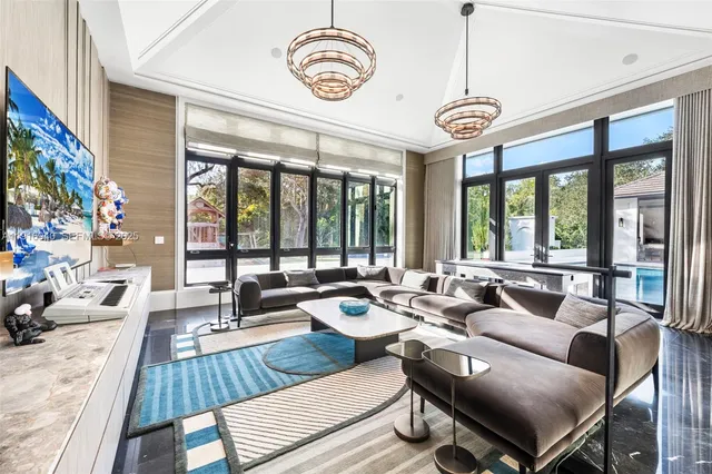 a very nice looking dining room with a gaming machine and a table