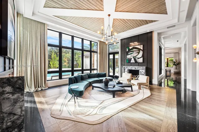a large kitchen with a table and chairs