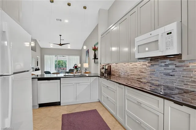 a view of a room with furniture window and wooden floor