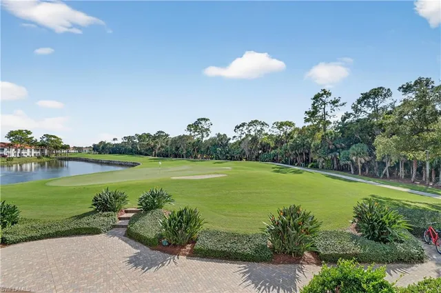 a view of a lake with a big yard