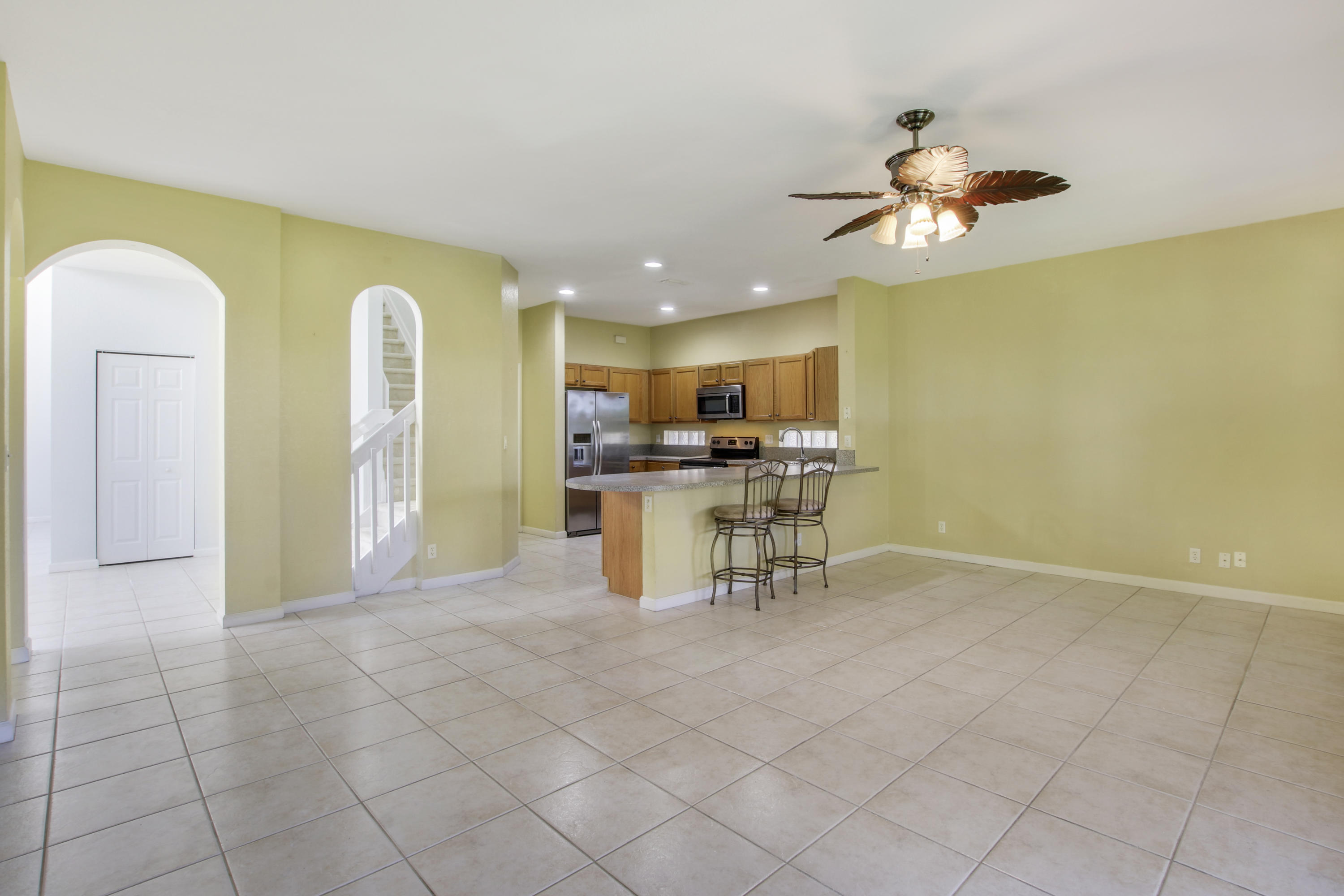 1257 Rose Gate Boulevard Riviera Beach, FL 33404 - Photo 6 of 32 Family Room/Eating Area/Kitchen