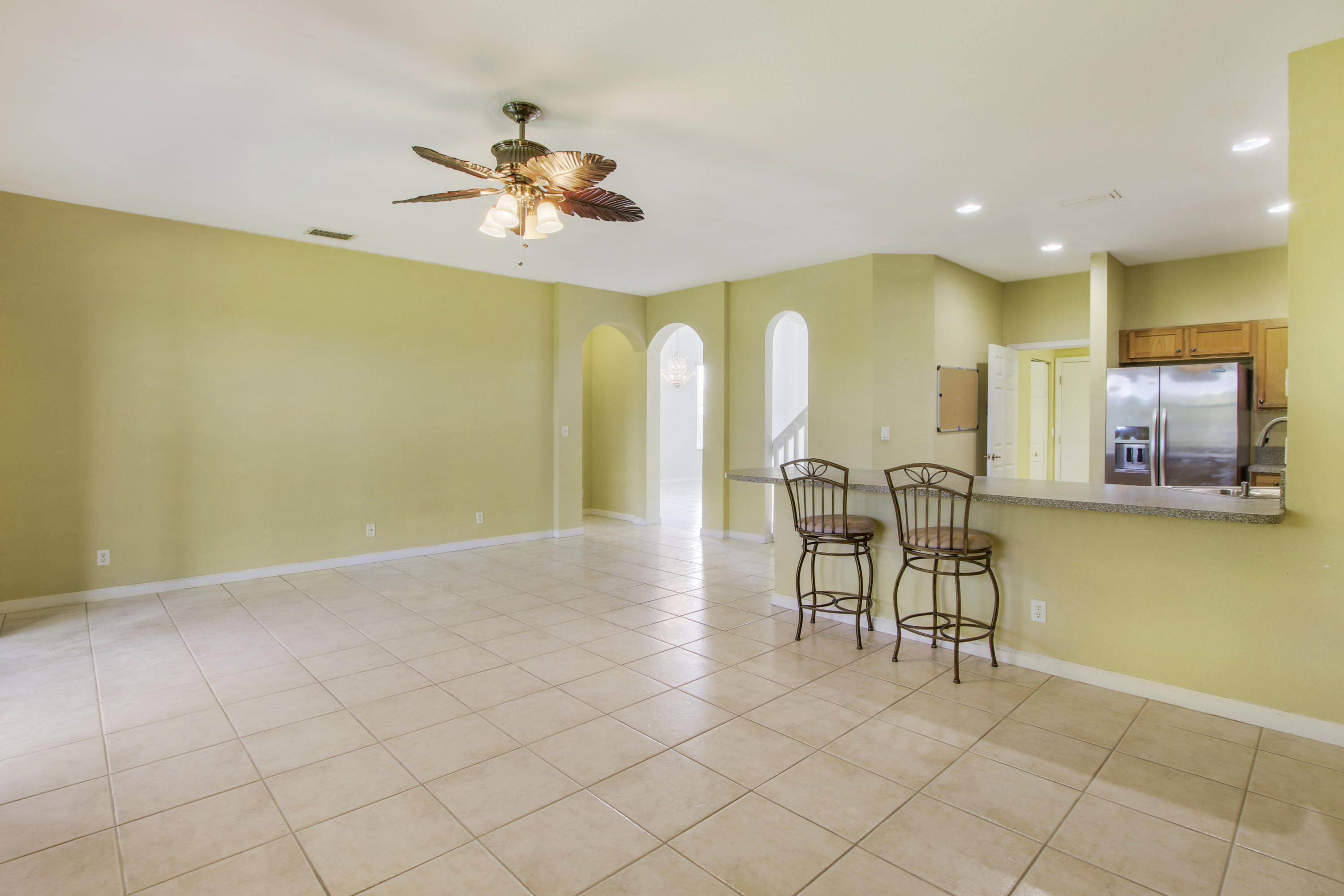 1257 Rose Gate Boulevard Riviera Beach, FL 33404 - Photo 7 of 32 Family Room/Eating Area/Kitchen