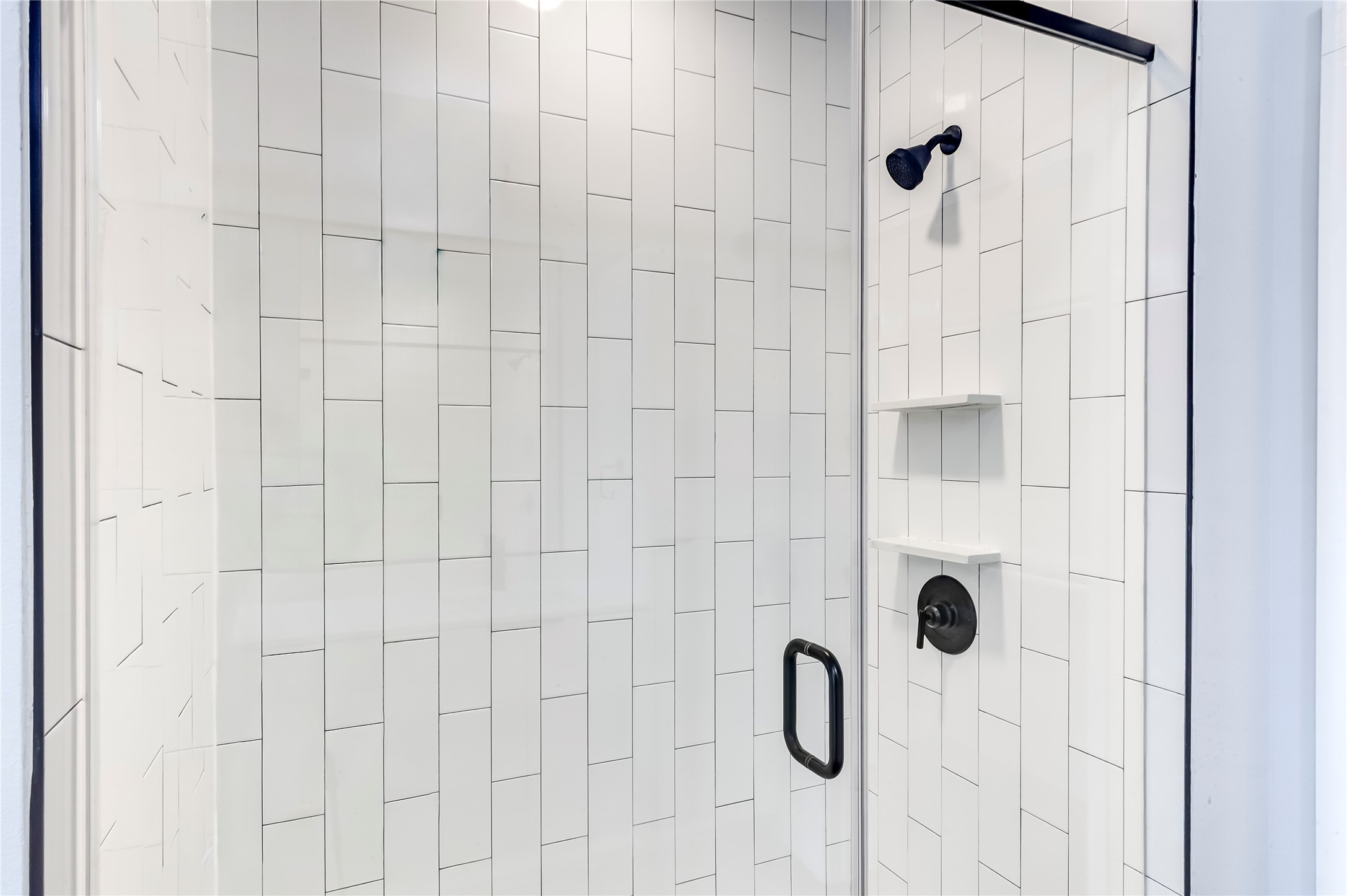 2500 Longview Street, Unit 402 Austin, TX 78705 - Photo 18 of 27 a bathroom with a shower