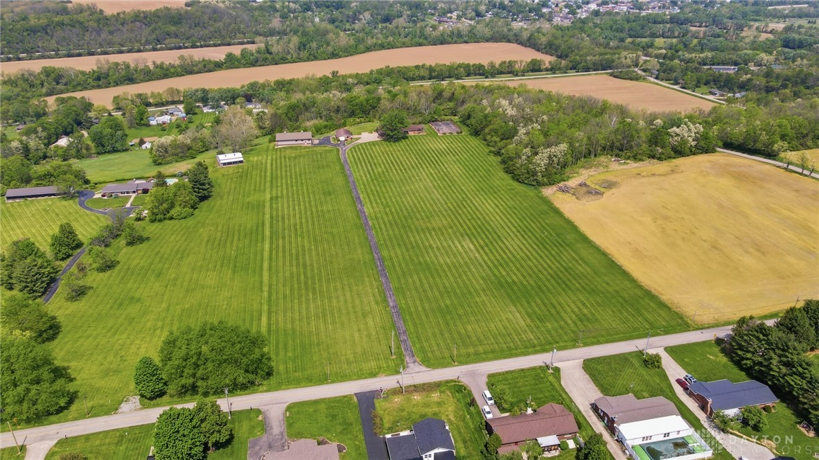 5669 O Neall Road Waynesville, OH 45068 - Photo 5 of 72 This elevated view captures vast green fields and surrounding residential properties.