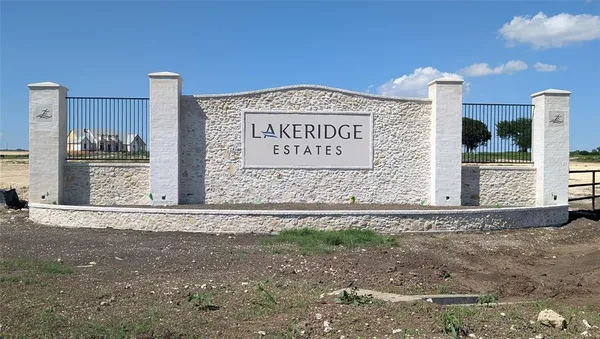 a sign on the side of a street