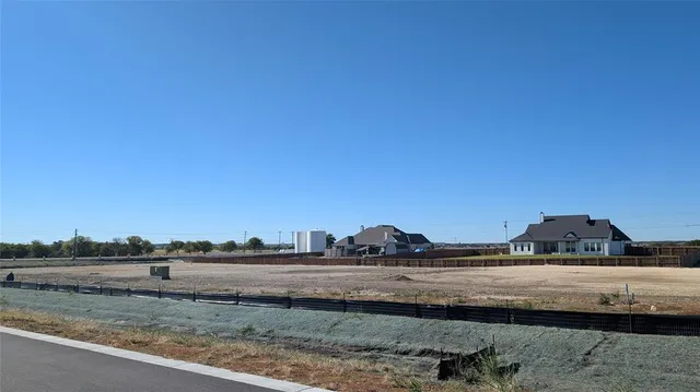 a view of a road with an ocean view