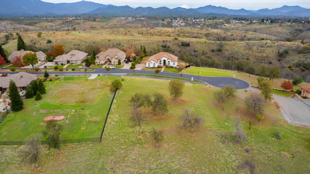 a view of a lake with mountains in the background