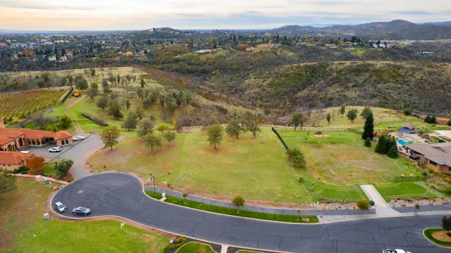 swimming pool view with a lake view