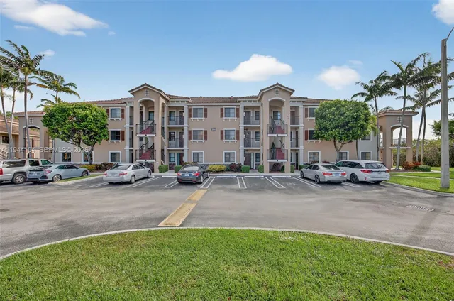 a view of a street with cars