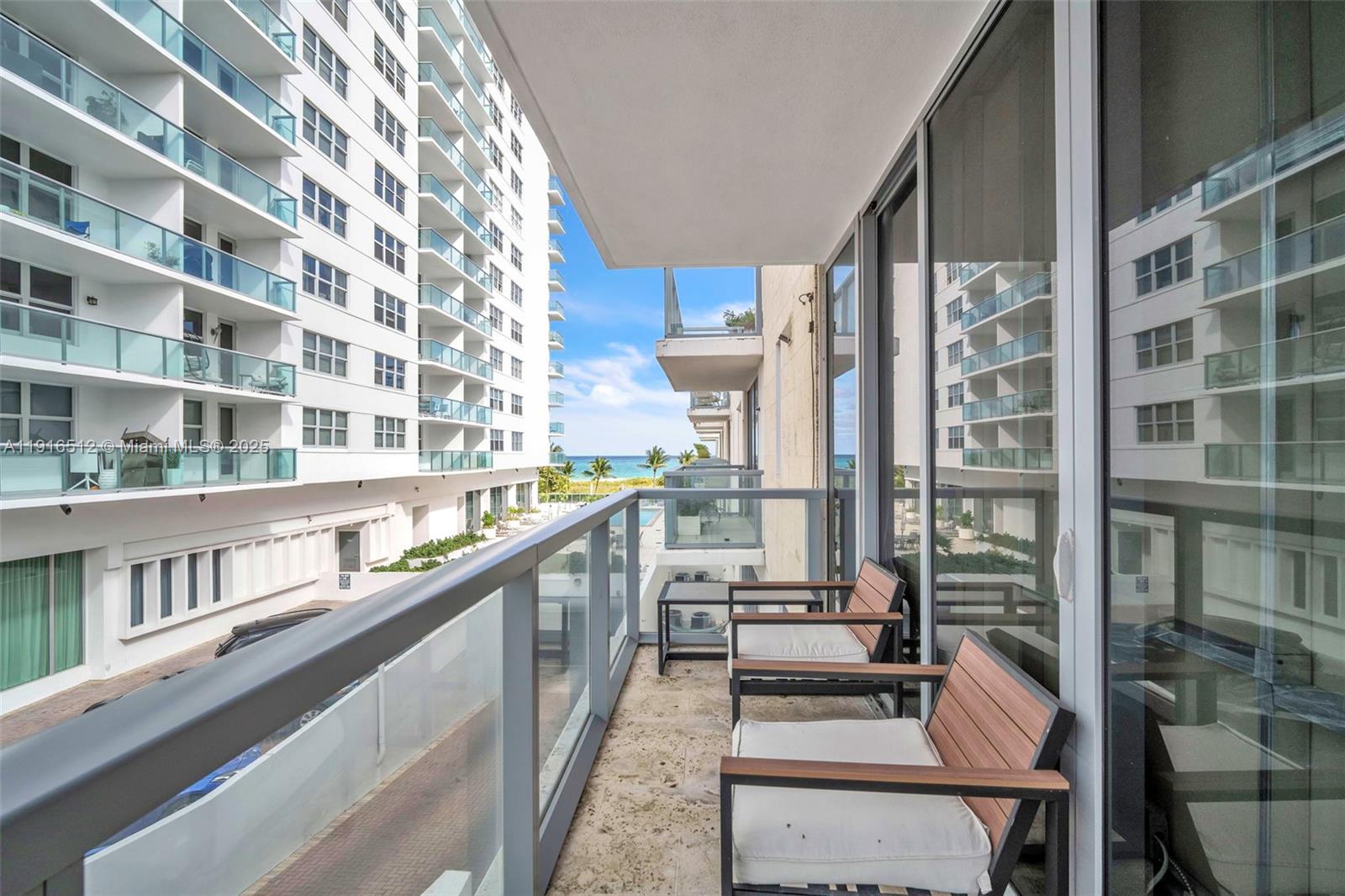 9501 Collins Avenue, Unit 1 Surfside, FL 33154 - Photo 40 of 53 a view of balcony with furniture