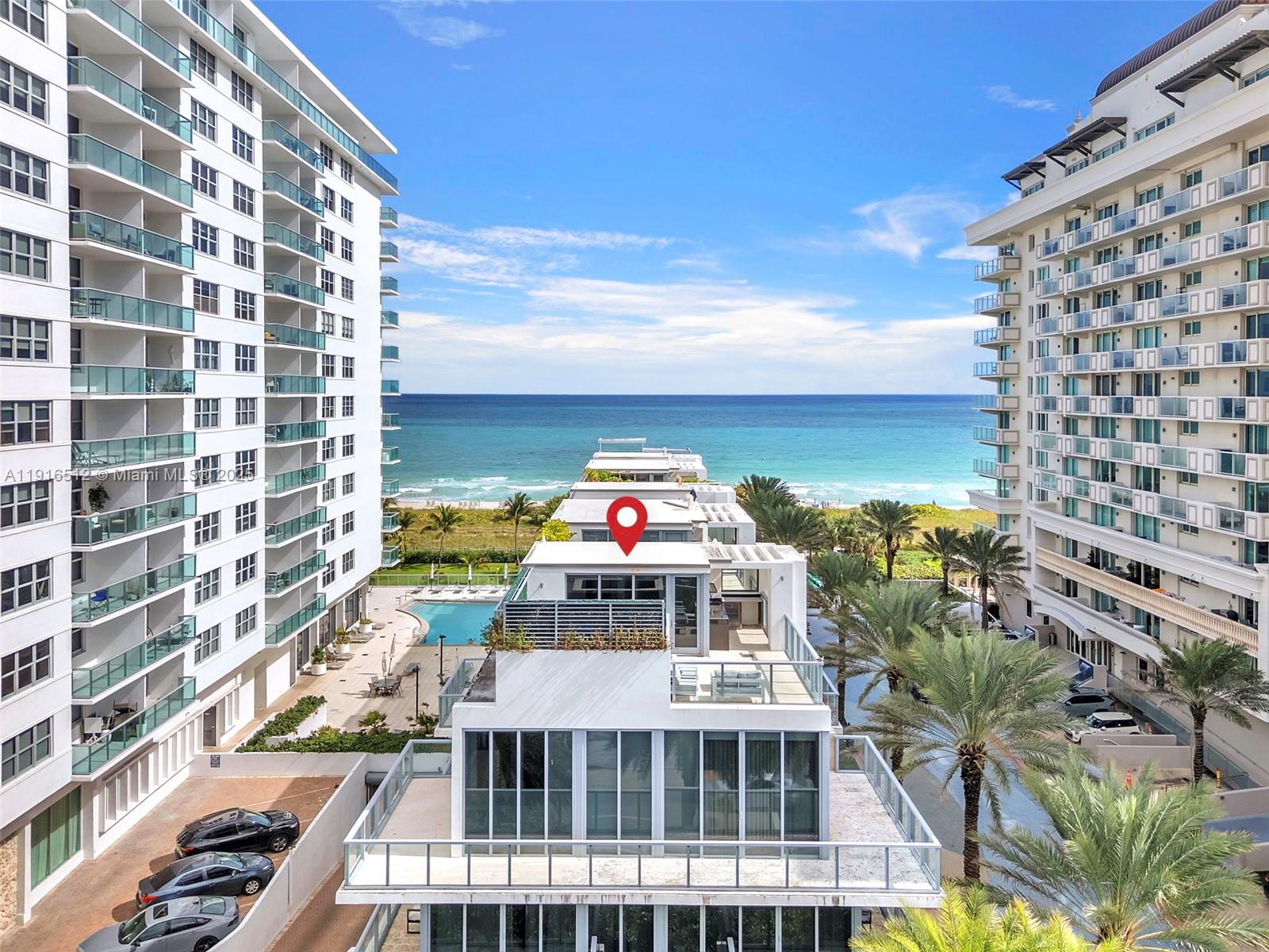9501 Collins Avenue, Unit 1 Surfside, FL 33154 - Photo 4 of 53 a view of a balcony with a yard