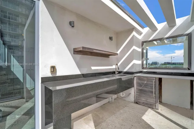 a view of a swimming pool with a yard