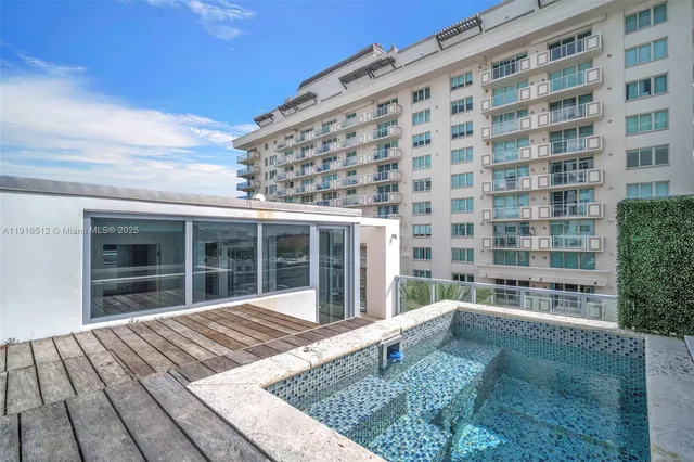 a view of a storage & utility room with washer and dryer