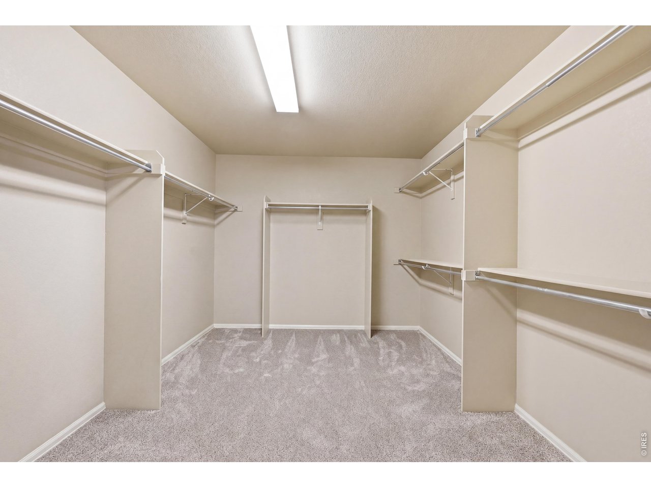 8709 Tack Street Frederick, CO 80504 - Photo 23 of 43 Primary Walk-in Closet
