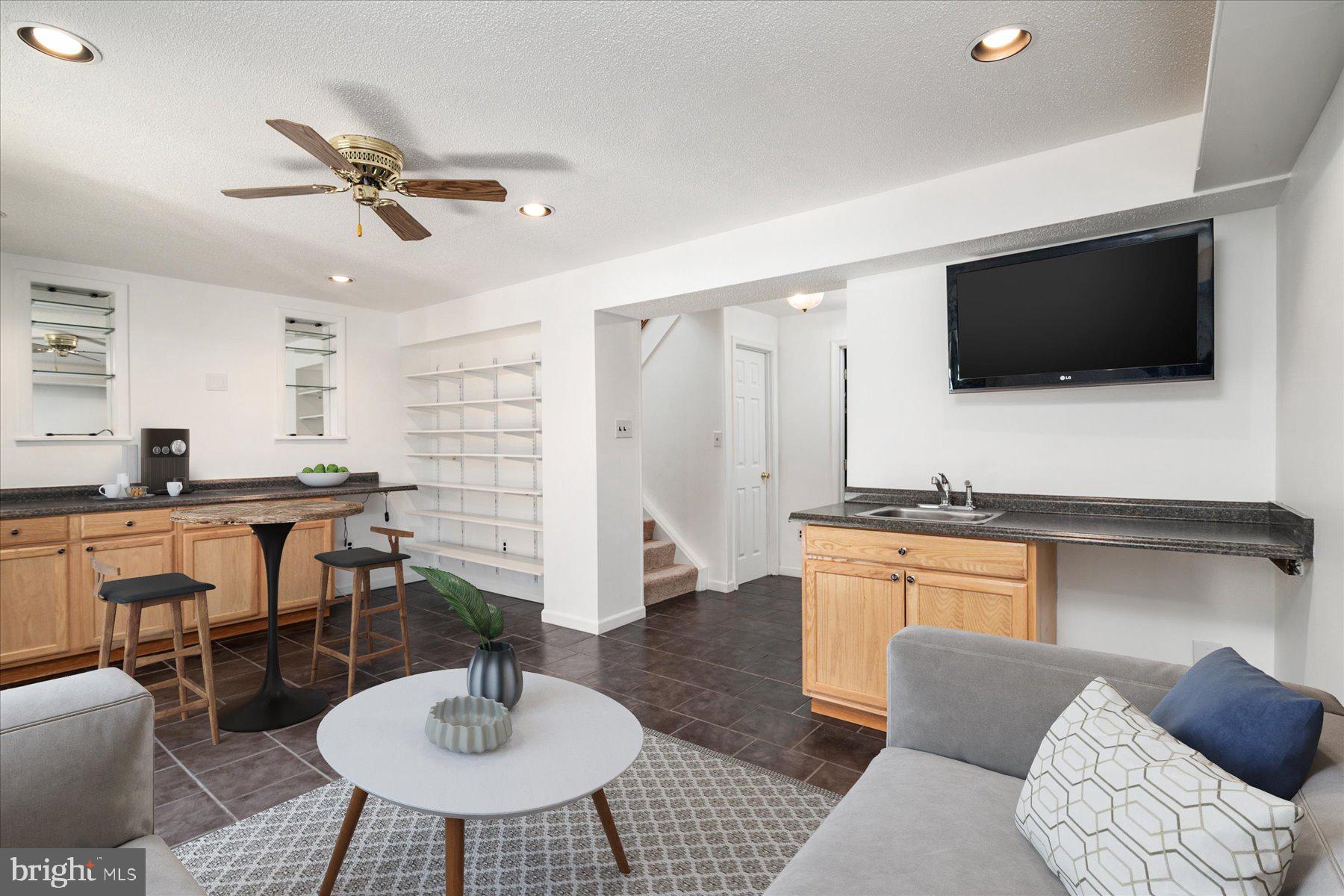 725 Dayspring Drive Odenton, MD 21113 - Photo 10 of 61 Lower-Level Family Room (Virtually Staged)