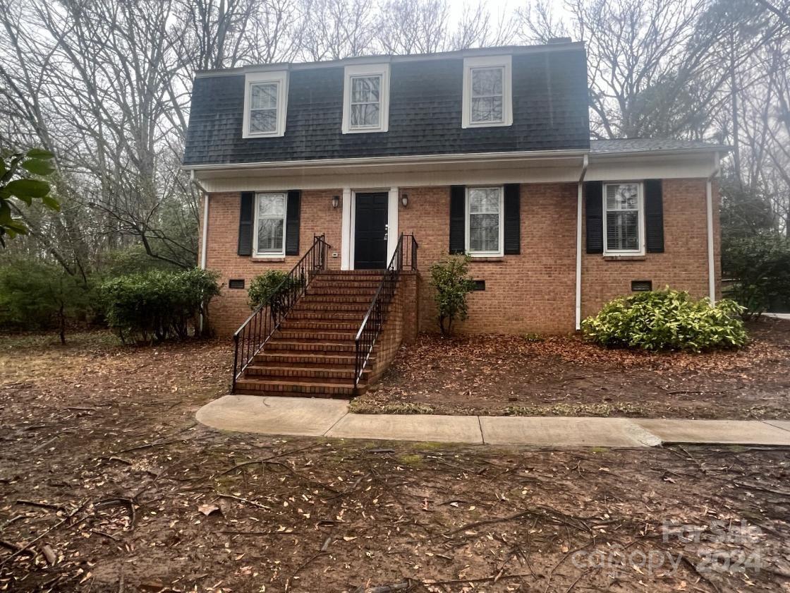 11714 Harrowfield Road Charlotte, NC 28226 - Photo 1 of 15 a front view of a house with a yard