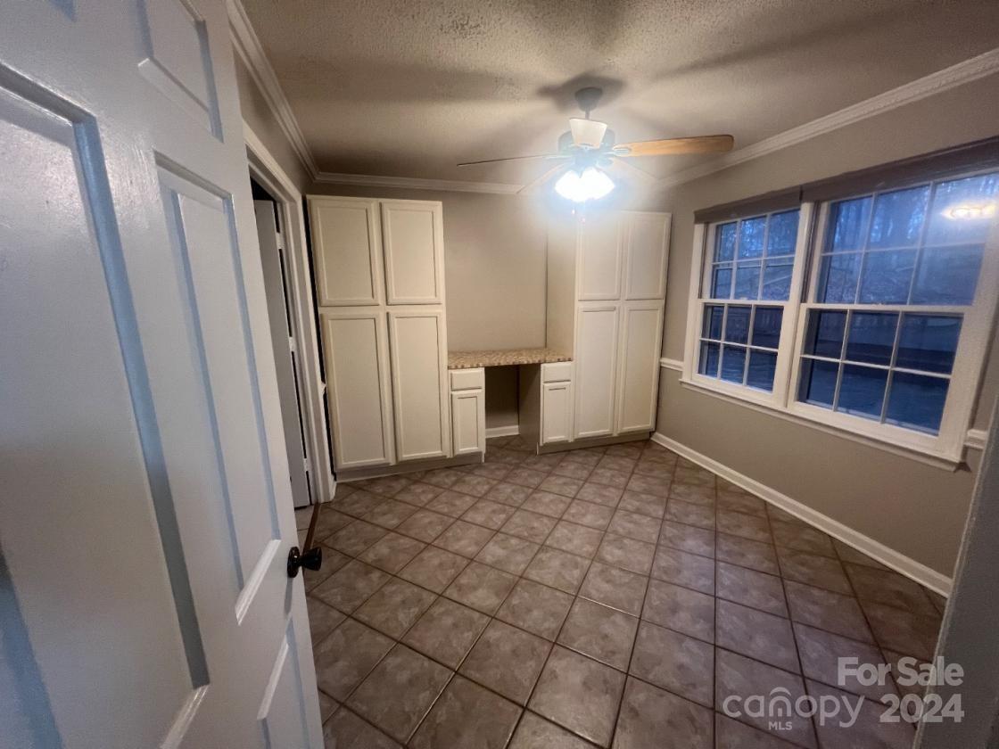 11714 Harrowfield Road Charlotte, NC 28226 - Photo 7 of 15 a view of empty room with windows