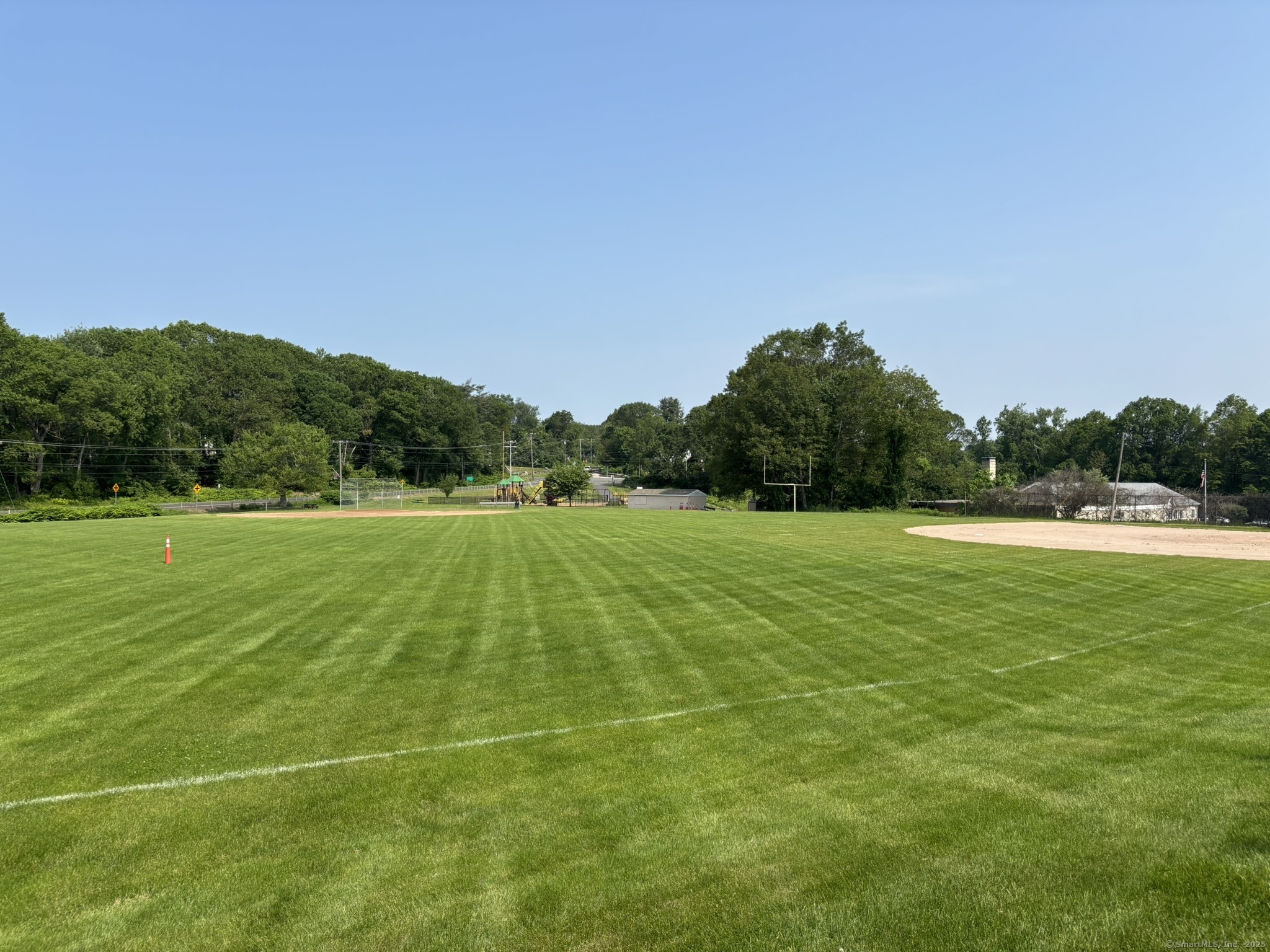 44 Cheshire Road Prospect, CT 06712 - Photo 35 of 39 a view of a golf course with a lake