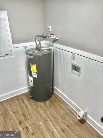 a view of a livingroom with wooden floor