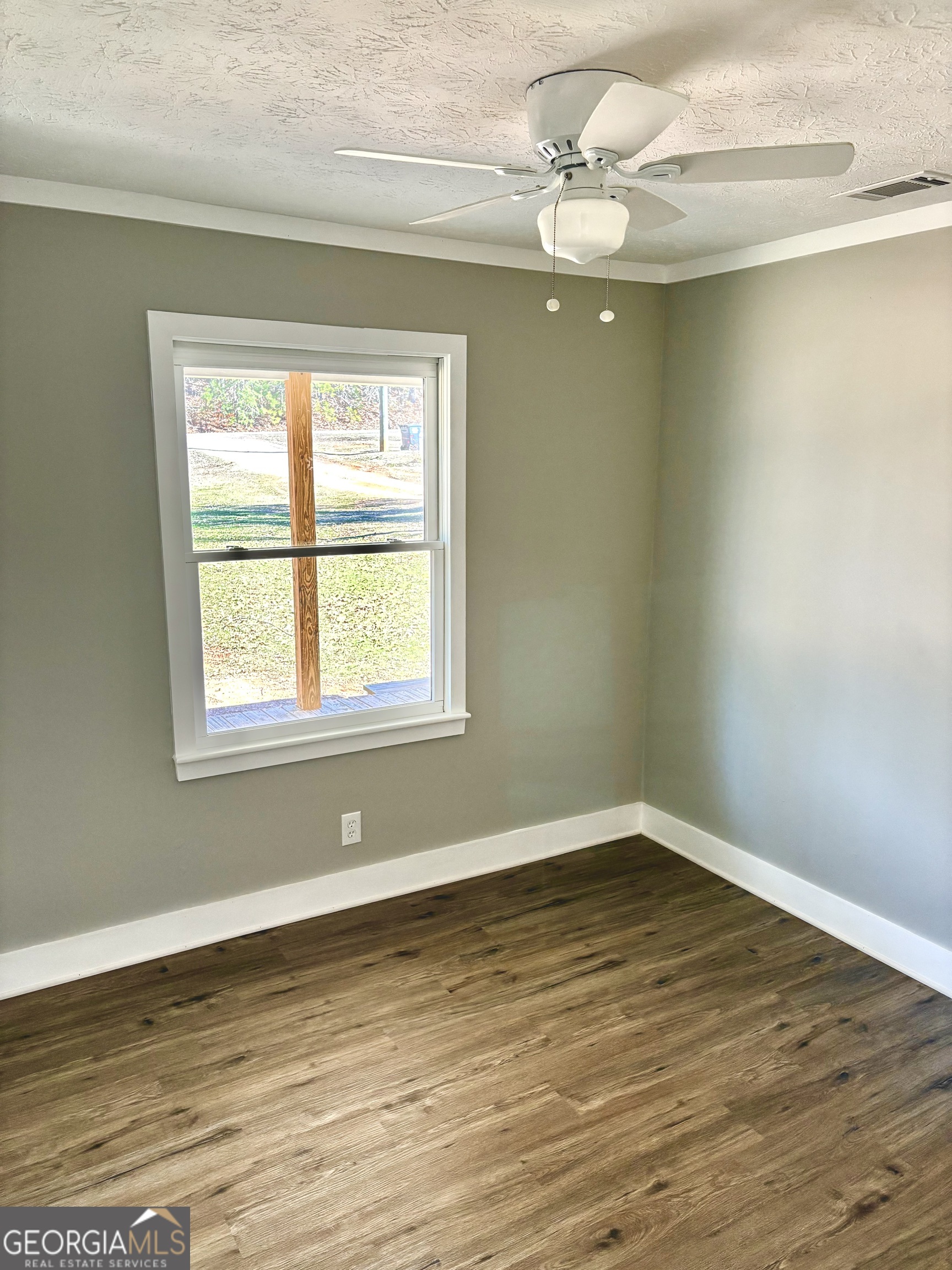 56 John Lovelace Road LaGrange, GA 30241 - Photo 16 of 26 a view of a room with wooden floor and a window